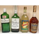 Three 70 cl bottles of "Gordon's" gin; a 70 cl bottle of "Jose Cuervo Margarita" and similar 2