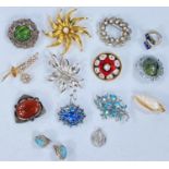 A selection of vintage and later costume brooches etc