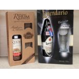 A 70 cl bottle of "Legendario" rum, in presentation box; a 70 cl bottle of "Dillon" rum, in