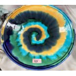 A POOLE STUDIO dish with free form spiral pattern, signed J.T, 35cm