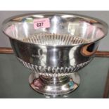 A hallmarked silver rose bowl with ribbed decoration, on foot, London 1966, diameter 18.5 cm; 13 oz