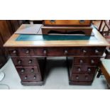 A Victorian mahogany kneehole desk with 3 frieze drawers and 6 pedestal drawers