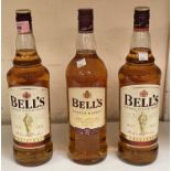 Three 1 litre bottles of "Bell's" whisky