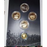WWI Centenary - Lone Soldier 9ct gold coin, with 4 gilt medallions in presentation wallet "The War