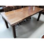 An oak period style dining table with heavy plank top, on square legs