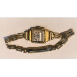 An 18ct gold back early 20th century wristwatch