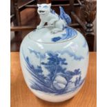 A Japanese late 19th/early 20th century Hirdo lidded vase, blue and white decoration, mythical beast