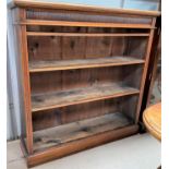 An early 20th century walnut 4 height bookcase