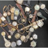 A quantity of vintage gent's and ladies wristwatches