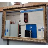 A rectangular gilt framed wall mirror.