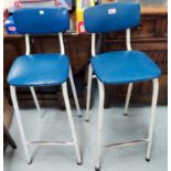 Two vintage blue vinyl seat and backed metal high stools and three similar vintage chrome and