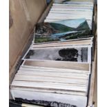A box of loose postcards