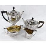 A Georgian style hallmarked silver 4 piece tea and coffee set in the classical manner, oval shape
