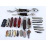 A good selection of penknives of various design and fruit knives, combination knife fork,