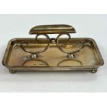 A hallmarked silver rectangular pen tray with raised holder, London 1904, 14 cm, 4 oz