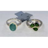 A large oval green Grandidierite and diamond ring in silver setting, size N/O, 3.38gms ; a chrome