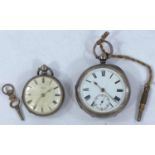 A hallmarked silver pocket watch and another smaller half Hunter pocket watch with a silver case.