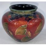 A Moorcroft squat vase, signed to base, height 6 cm