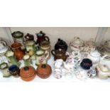A selection of decorative teapots; jugs; etc.
