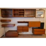 A 1960's/70's teak wall nit comprising 9 'floating' sections