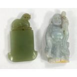 A Chinese hard stone carving in the form of an axe head with dog to top and a buddha with Smether