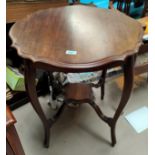 A circular Edwardian 2 tier mahogany occasional table; a square top pedestal occasional table