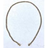 A gold chain formed from flattened oval fancy links, length 43cm, stamped "750", 22.8gm