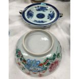 A large Chinese famille rose bowl, 23.5cm; a Chinese blue and white warming dish dia. 29cm (both