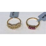 A 9ct gold ring set with 3 oval Thai rubies 0.8cart and white zircons, size L/M, 1.6gms; a 9ct