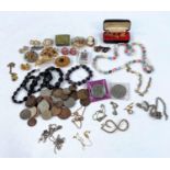 A selection of costume jewellery; coins; a silver plated 3 piece tea set; etc.