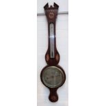 An inlaid banjo shaped barometer with brass dial by J. Berry Leister