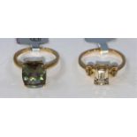 A 9 carat hallmarked gold dress ring, set with rectangular Csarite gem stone 7 x 5mm, flanked by 8