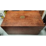 A 19th century mahogany military style chest with hinged lid and brass binding