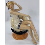 A Peggy Davies figure:  Marilyn Monroe, decorating sample, height 21 cm