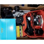 A selection of assorted vintage SLR cameras, Zenit-E lenses, tripods etc