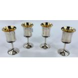 A set 4 pedestal sherry cups in parcel gilt silver, maker A.T.C., Birmingham 1973, 9.3 oz