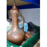 A copper Middle Eastern lidded vase with handle and collectables