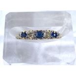 A Victorian style white metal ring set alternating sapphires and diamonds, unmarked, tests as 18 ct,