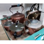 Three 19th century copper kettles; a teapot