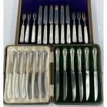 A set of mother of pearl and hallmarked silver knives and forks, Sheffield 1920, a cased set of