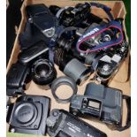 Nikon, Canon, Minolta cameras and assorted lenses