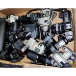 Nikon, Minolta and Olympus cameras with assorted lenses