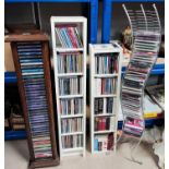 A large collection of CDs on stands etc, Country, Jazz etc