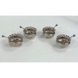 A set of four hallmarked silver cruets and spoons, Birmingham 1890, 3oz gross.