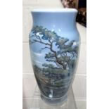 A very large Royal Copenhagen baluster vase decorated with a river landscape, printed mark