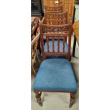 An Edwardian set of 4 Arts & Crafts style dining chairs with high backs