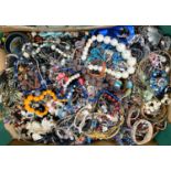 A large collection of various costume jewellery, necklaces etc