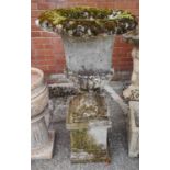 A Victorian style reconstituted stone garden urn on pedestaql
