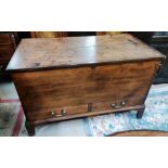 A late 18th century Countrymade oak mule chest with hinged lid, 2 drawers and bracket feet