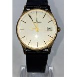A gents Garrard digital wristwatch, 9 ct gold hallmark to back